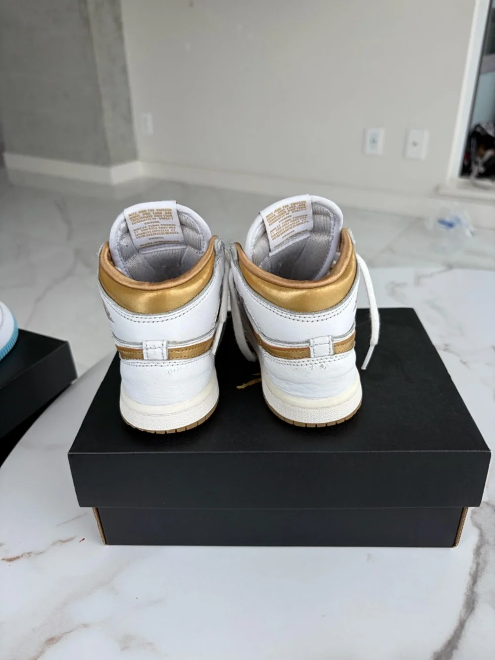 Nike Kids White and Tan High-Top Sneakers with Gold Logo Accent - Picture 3 of 5